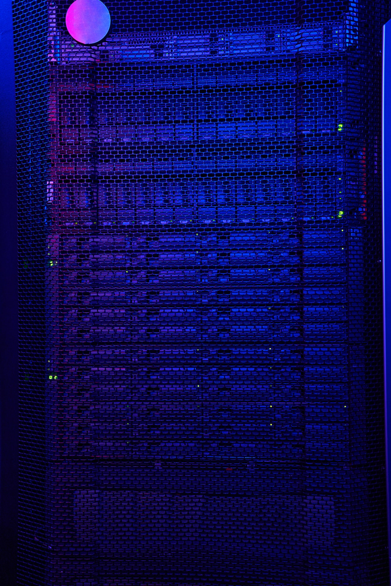 Picture of storage server with many HDD disks inside rack in tech place